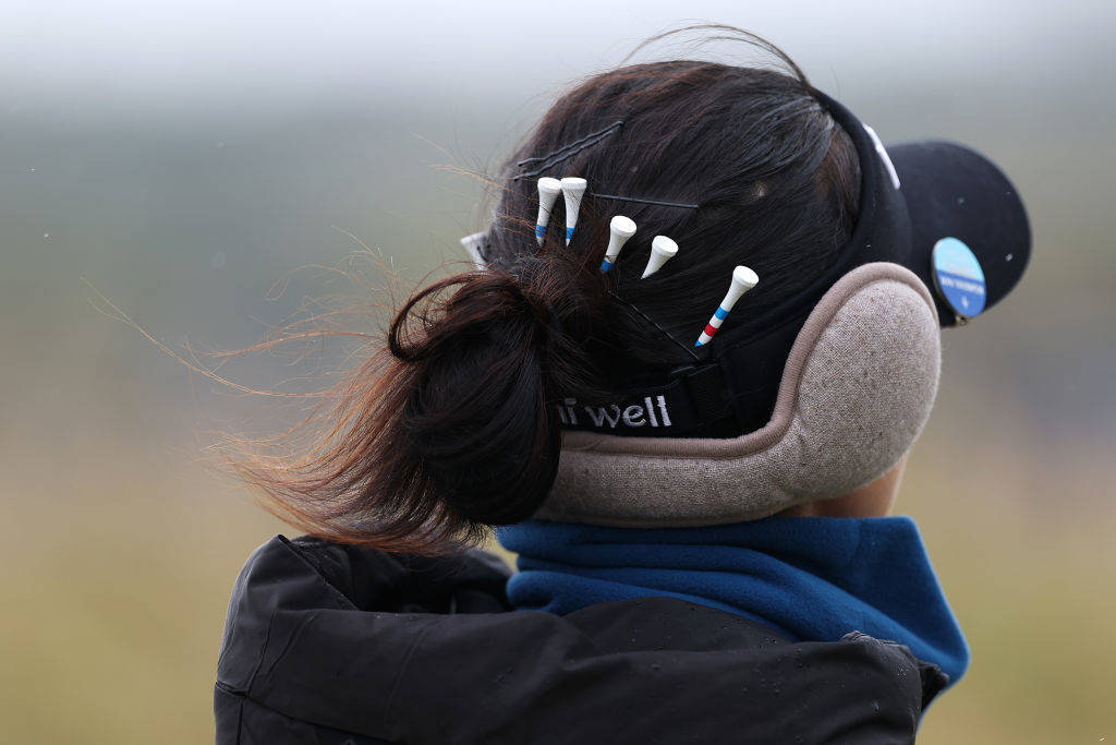 A detailed view of tees in the hair of Lydia Ko of New Zealand (obscured) during a Pro-Am ahead of the AIG Women's Open